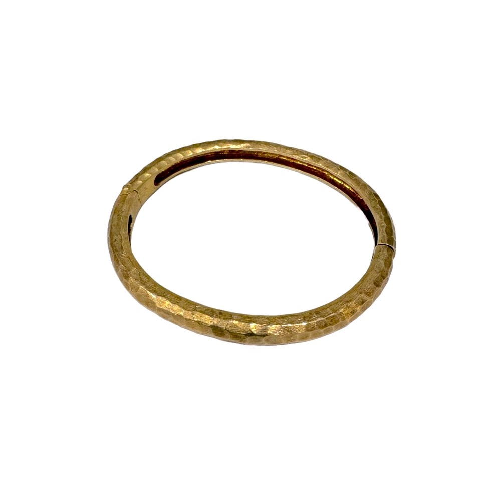 Fitted hammered gold tone bangle bracelet. EUC